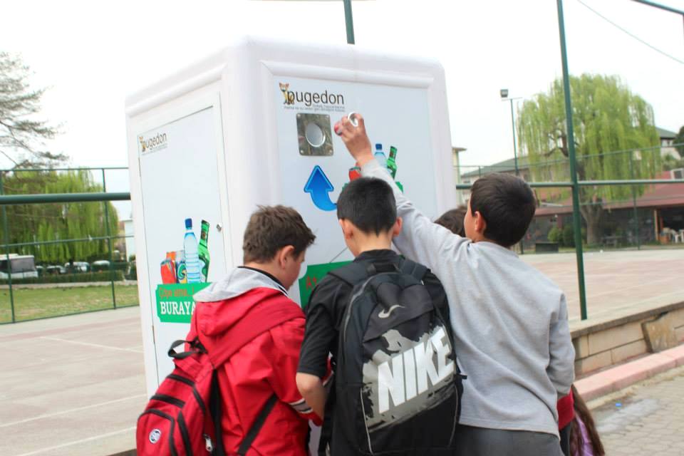 Children gathering to recycle.