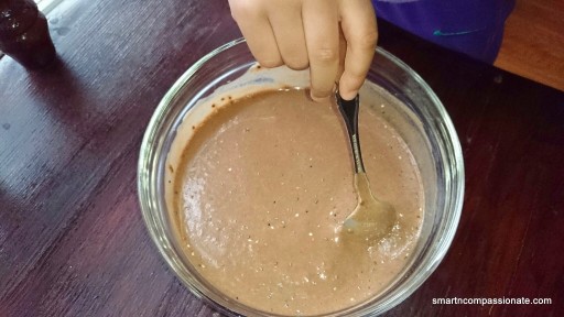 My little helper mixing in the chia seeds.