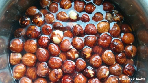 Hazelnuts soaking in water.